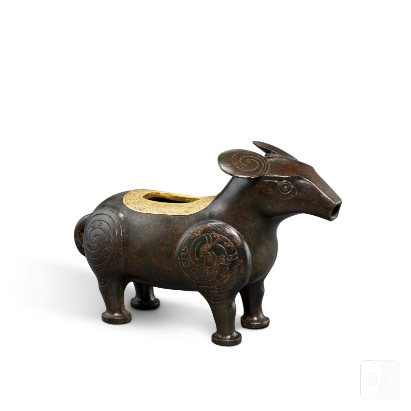 A gold-wrapped bronze archaistic 'tapir' vessel, zun, Ming dynasty | 明 青銅仿古包金口貘尊